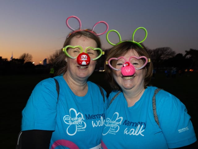 Jackie Seckington and Pam Palmer came to Castle Field, Southsea to take part in the Alzheimers Society Glow Walk on Friday evening. Photos by Alex Shute
