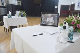 Thousands have signed a petition for the Queen to be honoured in an annual bank holiday. Pictured is the book of condolences at Portsmouth Guildhall. Picture: Sarah Standing (120922-3192).