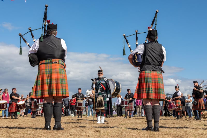 The combined bands of Rose & Thistle and Hampshire Caledonian perform barrack room favourites on bagpipes.