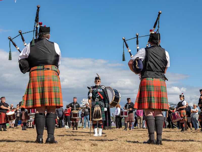 The combined bands of Rose & Thistle and Hampshire Caledonian perform barrack room favourites on bagpipes.