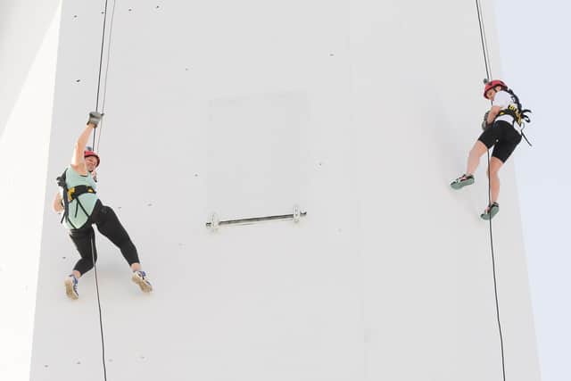 Pictured is: Monnie Fard(left) and Chantelle Knight begin their descent
Picture: Keith Woodland (170721-53)