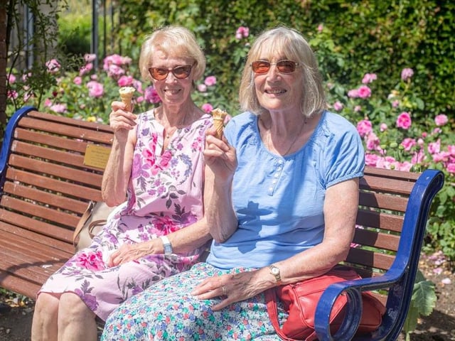 Elaine Morgan and Barbara Keefe enjoying an ice cream at the Rose Garden, Southsea