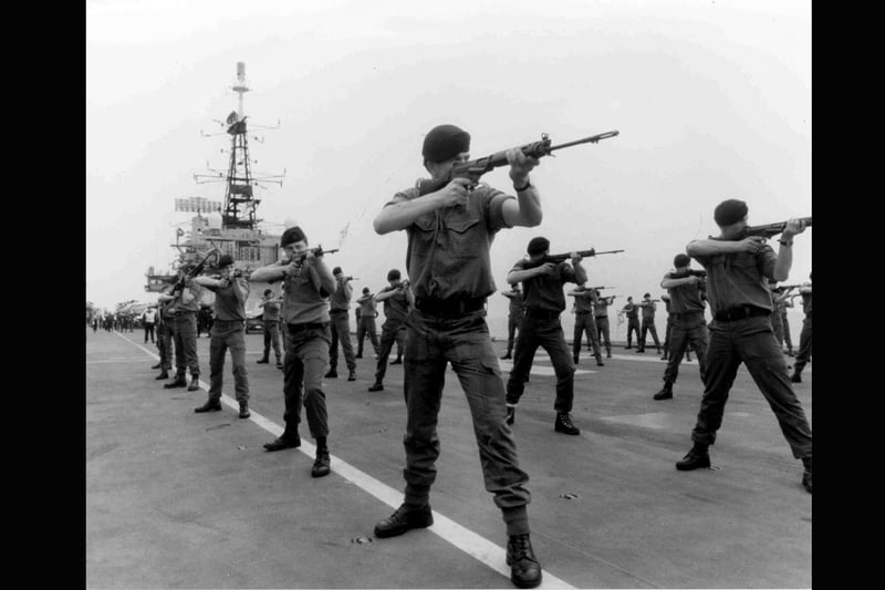 Task Force Heads for Falklands. Royal Marines exercise on the deck of HMS Hermes, the Flag Ship of the British Task Force on route for the Falkland Islands. PA/Martin Cleaver aboard HMS Hermes. April 6 1982