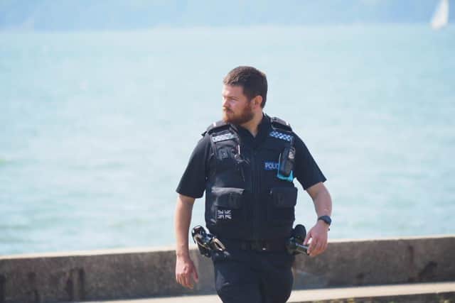 Police and immigration enforcement officers at Hill Head after a major operation detained a large number of cockle pickers who are possible victims of slavery. Picture: Habibur Rahman