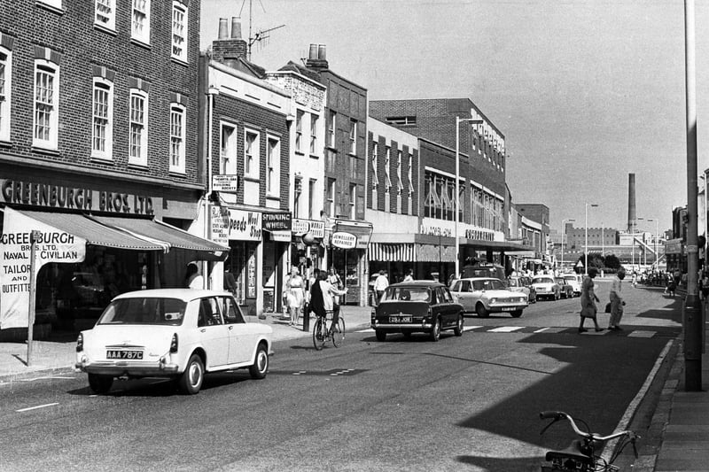 Gosport High street with cars, cyclists and pedestrians moving along in 1974. The News PP4773