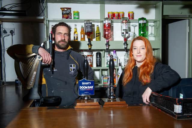 Chrissy Sloan, who took over the Milton Arms in September 2020 for Love your Local.Pictured: Christine Sloan with her partner, Dan Smith at the Milton Arms, Portsmouth on 3 February 2021.Picture: Habibur Rahman