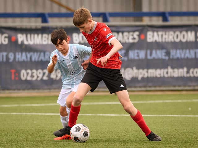 Action from the Portsmouth Youth League Geldard Invitation Cup final between Jubilee 77 U13s and Castle United U13s (light blue and white kit). Picture: Keith Woodland (190321-438)