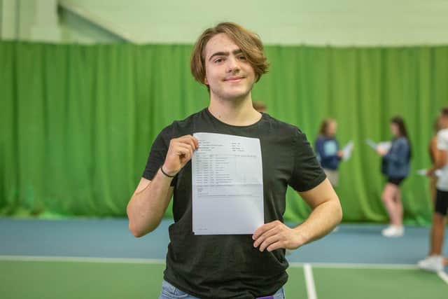 Theo Vaughan with his results at Priory School in Southsea
Picture: Habibur Rahman