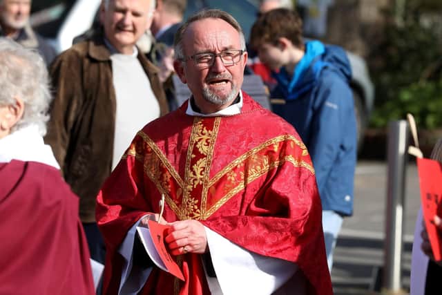 The service started outside the Heroes Pub and ended at St George's Church. Picture: Sam Stephenson.