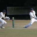 Josh Hill batting during the Hampshire final of the National Village Cup between Sarisbury Athletic and Easton and Martyr Worthy at Allotment Road. Picture: Neil Marshall.