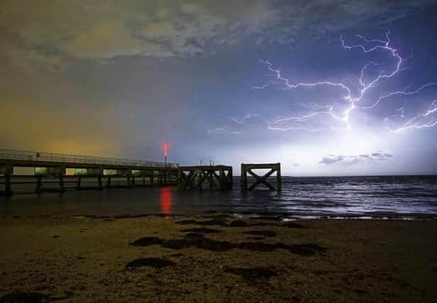 Lightning seen from Eastney beach in May this year Picture: @liamnashphotography / Neil Harris Instagram: @champ4334