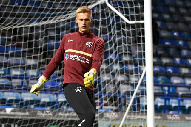 Alex Bass is once again on the bench for Pompey against Harrogate