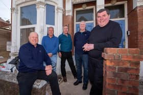 Portsmouth Community Housing Trust has finally got the go-ahead to refurbish two disused properties and bring them back into use for homeless families. Pictured, left to right, are Keith Johnson and Neil Scutt - directors of JPC Property Services, which is carrying out the work - trust secretary Andrew Mason, trust board member
Mark Singleton and trust chairman Father Bob White. Picture: Habibur Rahman