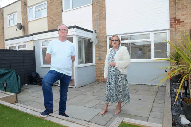 Anita (66) and Sid Hopkins (58) roof on their house in Plumley Walk, Havant, they have rented from Guinness for 25 years blew off during Storm Eunice as well as the porch roof at the front of the property. As a result everything inside the house was soaked and damaged and they have been living in alternative accommodation for the last 9 weeks.Picture: Sarah Standing (180422-1470)