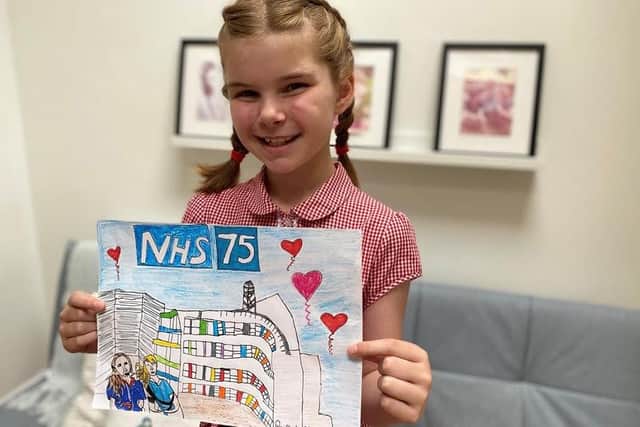 Phoebe Rimmer with her NHS 75 drawing