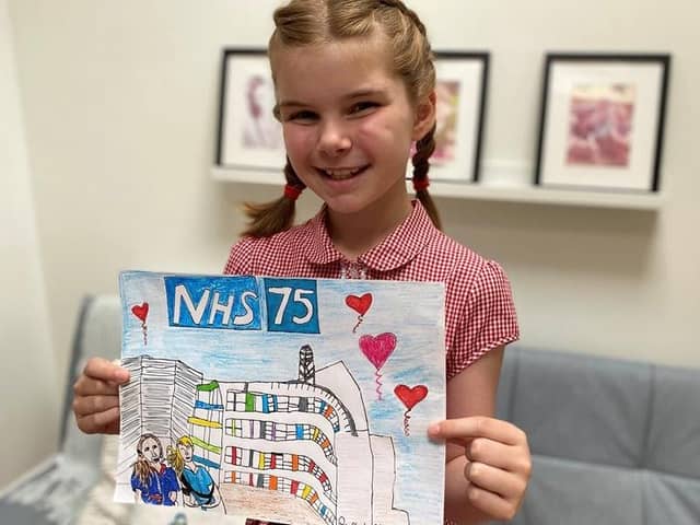 Phoebe Rimmer with her NHS 75 drawing