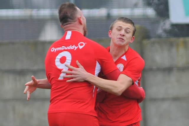 Connor Duffin, left, congratulates Zack Willett on his goal. Picture: Martyn White
