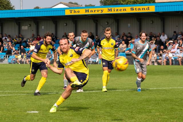 Theo Widdrington converts a penalty during his loan spell at Gosport Borough last season. Picture: Mike Cooter