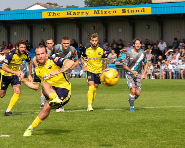 Theo Widdrington converts a penalty during his loan spell at Gosport Borough last season. Picture: Mike Cooter