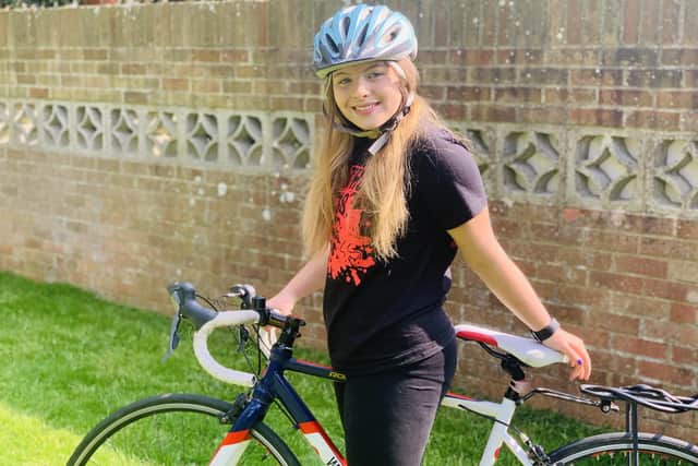 Zara Hayward, 13 from Hayling Island, cycled several times around the island on Sunday to do 26 miles for The Alzheimer's Charity and Mind. 
Picture: Martine Walling