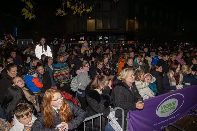 Hundreds of residents descended on Commercial Road to watch local dance troops and celebrities come together to turn on the Christmas lights.
Pictured - Hundreds turned out to watch the Christmas Lights turned on
Photos by Alex Shute