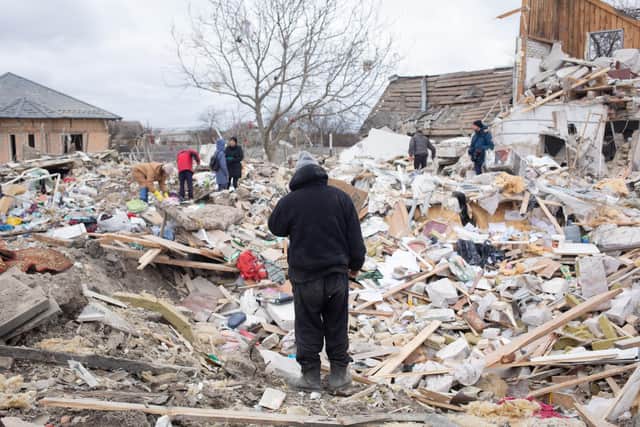 Ihor Mazhayev, 54, photographed next to his destroyed house on March 5 in Markhalivka, Ukraine. Ihor lost his wife, 12 years old daughter and got a concussion as a result of a shelling. Regional police said six people died, including a child, and four were wounded in a Russian air strike on this village southwest of Kyiv. Picture: Anastasia Vlasova/Getty Images)