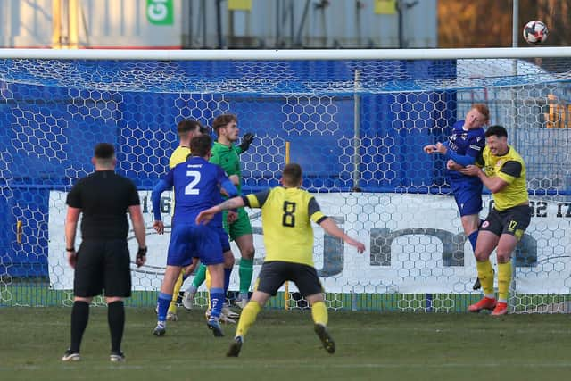 Baffins' Frankie Paige heads clear against Bournemouth Poppies. Picture: Chris Moorhouse