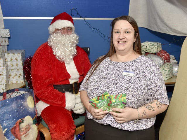 Beacon View Primary Academy in Paulsgrove held their annual community Christmas lunch on Friday, December 22.Pictured is: Danielle Belle from Co-op Funeralcare in Paulsgrove who donated sweets for the school.Picture: Sarah Standing (221223-4054)