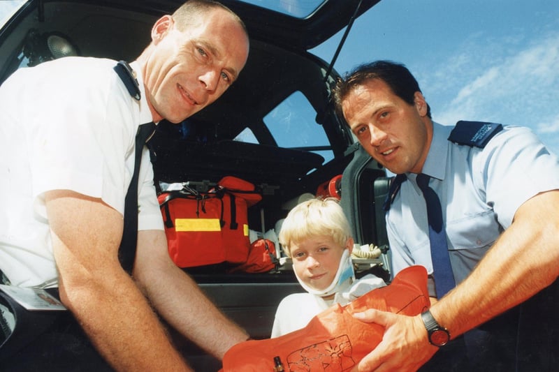 Paramedics David Mills (right) and Ted Heath demonstrate lifesaving techniques on Scott Mills at Fareham Ambulance Station in 1995. The News PP1991
