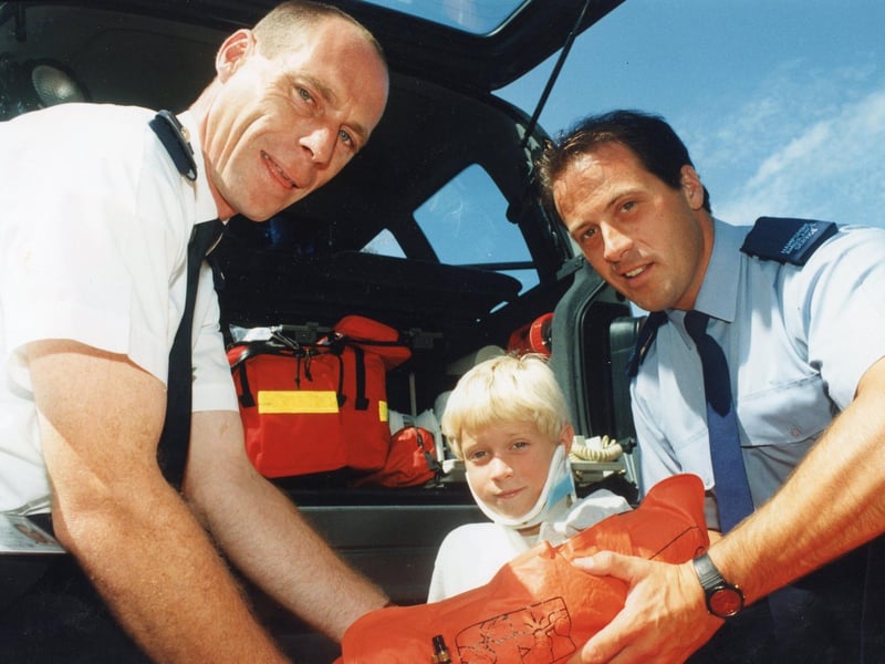 Paramedics David Mills (right) and Ted Heath demonstrate lifesaving techniques on Scott Mills at Fareham Ambulance Station in 1995. The News PP1991