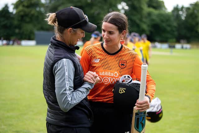 Charli Knott with head coach, Charlotte Edwards