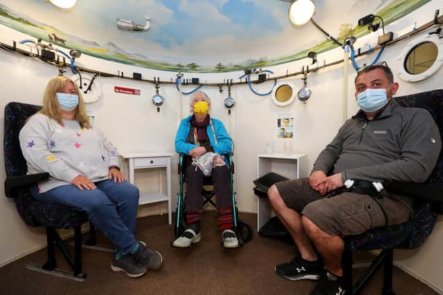 From left, Jan Allen, Jane Winfield and Mike Robinson in the hyperbaric chamber where they receive oxygen. The Solent MS Therapy Centre in Hewett Road, North End, is taking part in the National Multiple Sclerosis Centres Activity Challenge for MS awareness week
Picture: Chris Moorhouse (jpns 270422-04)