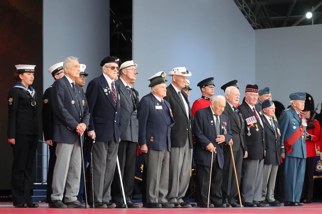 Veterans gather on stage at the D-day 75 Commemorations on June 05, 2019.