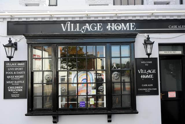 Some villagers have said they have been left 'frightened' after the Village Home pub had to close its doors after a suspected case of coronavirus.

Picture: Sarah Standing