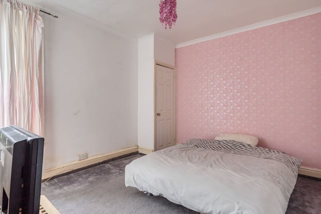 This double bedroom has the potential to become a beautiful space with a fresh lick of paint.