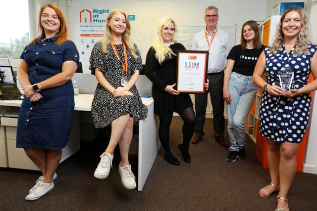 From left, Emma Morgan, Niamh Morgan, Jessica Bath, co-owner Joe Morgan, Zeta Marskell and Gabrielle Turner, all of Right at Home Portsmouth. 
Picture: Chris Moorhouse