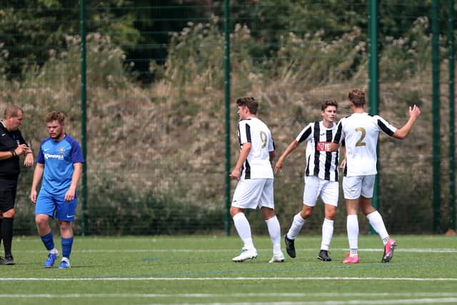Hayling celebrate after taking the lead against Baffins. Picture: Chris Moorhouse