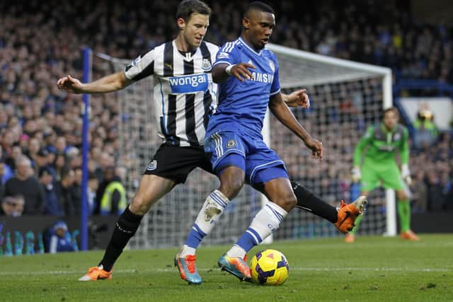 Mike Williamson in action for Newcastle against Chelsea's Samuel Eto'o in February 2014. Picture: IAN KINGTON/AFP via Getty Images