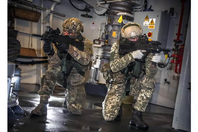 Ukrainian military personnel taking part in a drill on board HMS Dragon. Picture: LPhot Hutchins