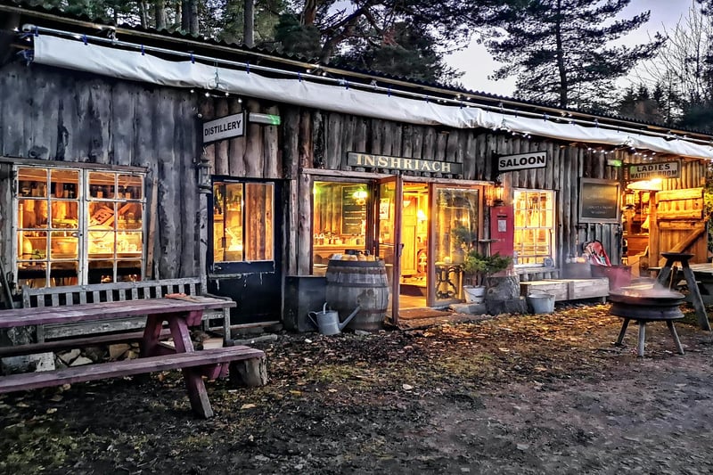 The 2015 winner, built by Walter Micklethwait
A few years ago this was a dilapidated hen house and an assorted pile of old junk. Now, after some very sporadic work it has become the Inshriach Farm shop, Ladies waiting room, Saloon Bar and Distillery. The General stores is a shop selling items we have carved or whittled on the farm and eggs and produce from the gardens. The ladies waiting room is a cheeky recycled velour upholstered piano bar and the saloon is a dirty wild west gin joint. In an unexpected twist to the shed tale, word got out that the bar was coming together and that we had juniper growing on the farm and before we knew it the shed became home to its very own gin distillery, complete with a lovely hand hammered set of stills from Portugal and its own all Scottish gin brand, Crossbill