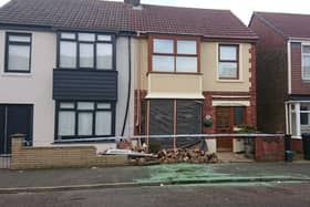 The condition of the house in Kensington Road, Copnor, after a crash on January 30. A silver Audi hit a parked blue Vauxhall, which then collided into the wall.