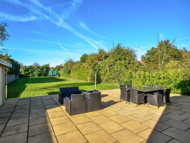 The property's garden is spacious and is a prime area for hosting in the summer.