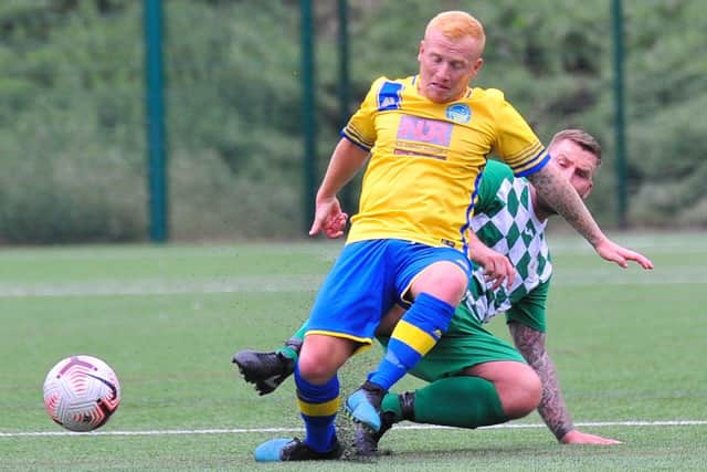 Meon's Harvey Cooper is tackled. Picture: Martyn White