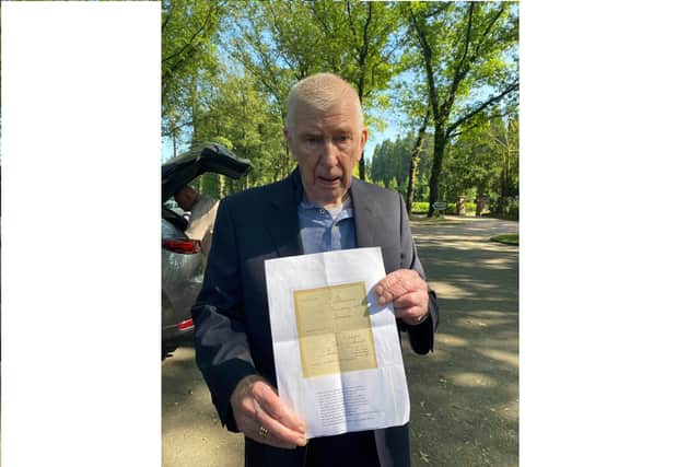 Mr Schuurmans of Osterbeek with the 'adoption papers' for the grave
Picture: Stefan Meekers