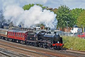 Steam special. 31806 `U` class Maunsell loco hauls the Father`s Day excursion to Brockenhurst and return, seen approaching Fratton Station on Sunday 20th June. This lovely shot taken by Graham Stevens