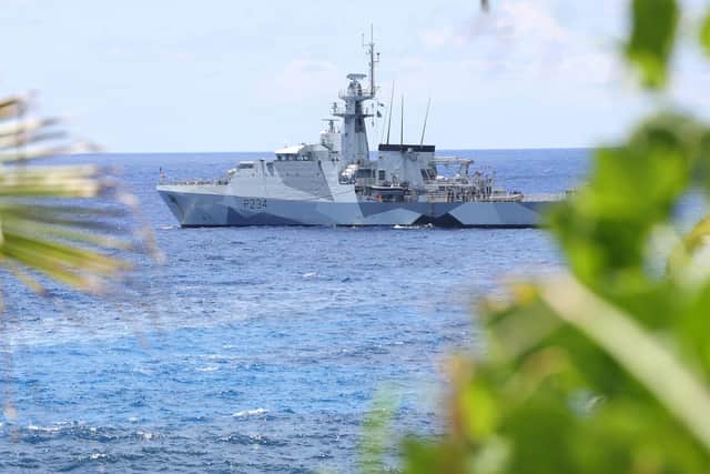 HMS Spey anchored in Bounty Bay in Pitcairn Island. 