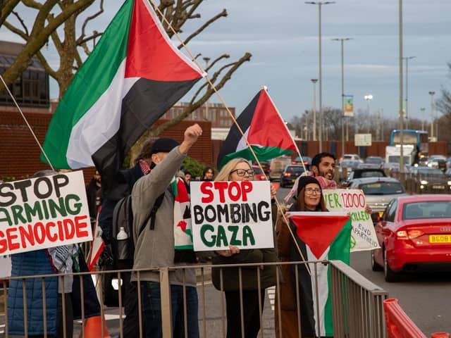 Pictured - Demonstrators outside Unicorn Gate
Photos by Alex Shute