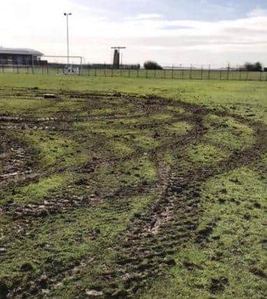 The damage to Baffins' pitch after vandals had driven a tractor all over it