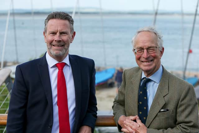 Longest serving trustee of the club, Tim Hancock, left, and guest of honour Lord Richards, former head of the British Army. A Memorial Service at Hayling Island Sailing Club for the Combined Operations Pilotage PartiesPicture: Chris  Moorhouse (050624-079)