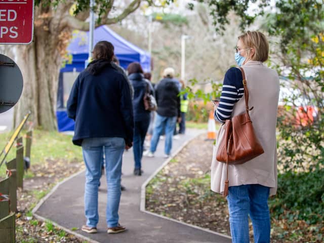 Pictured: People queuing to get their booster jab at  the Covid-19 vaccination centre at St Jame s Hospital, Portsmouth

Picture: Habibur Rahman